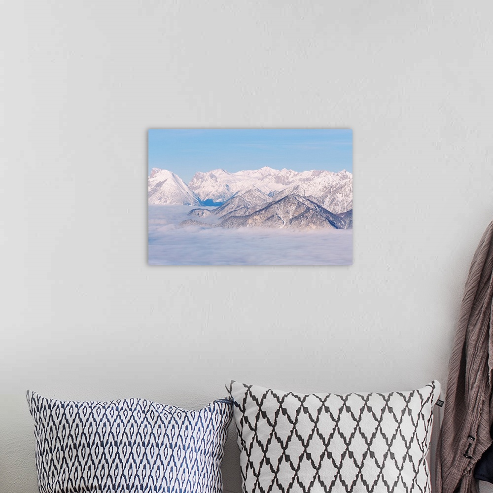 A bohemian room featuring The view over Zugspitze mountain on a foggy morning in the Inn valley, Patscherkofel mountain, In...