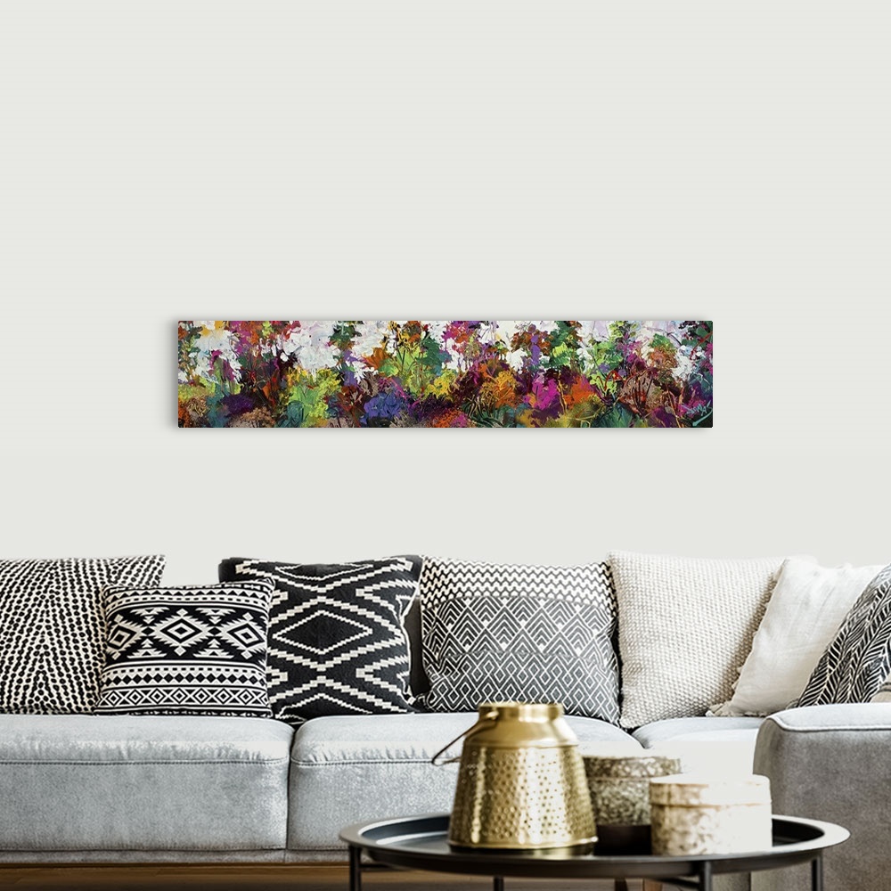 A bohemian room featuring A contemporary abstract painting using a wide spectrum of bright colors.