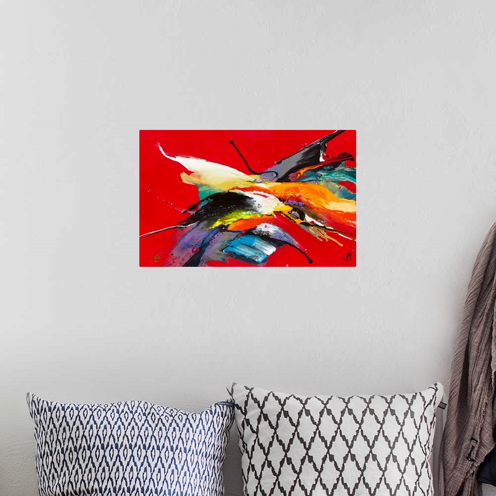 A bohemian room featuring Contemporary abstract painting using splashes of wild and vivid colors against a stark red backgr...