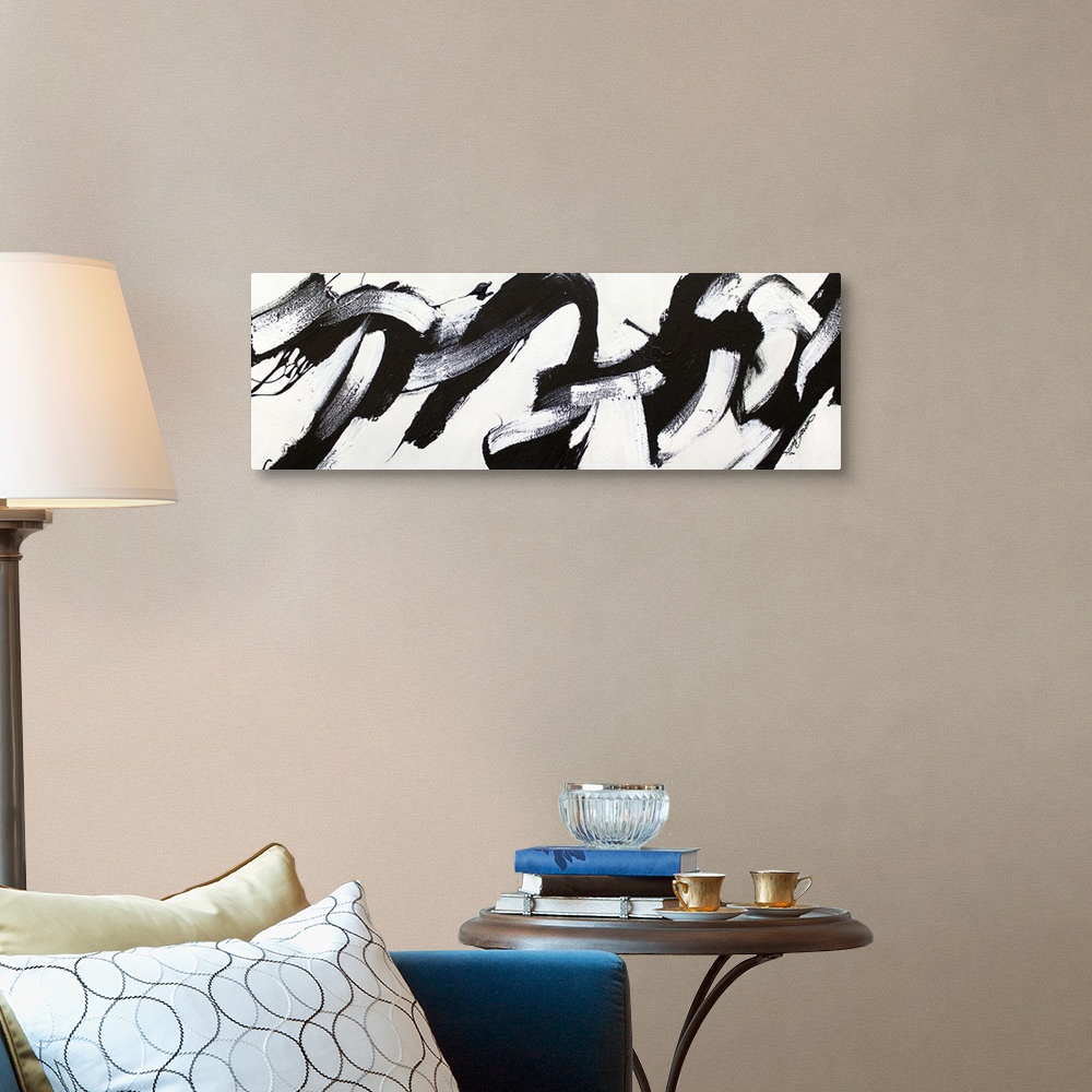 A traditional room featuring Contemporary abstract painting of bold black strokes of paint in fluid movements against a white ...