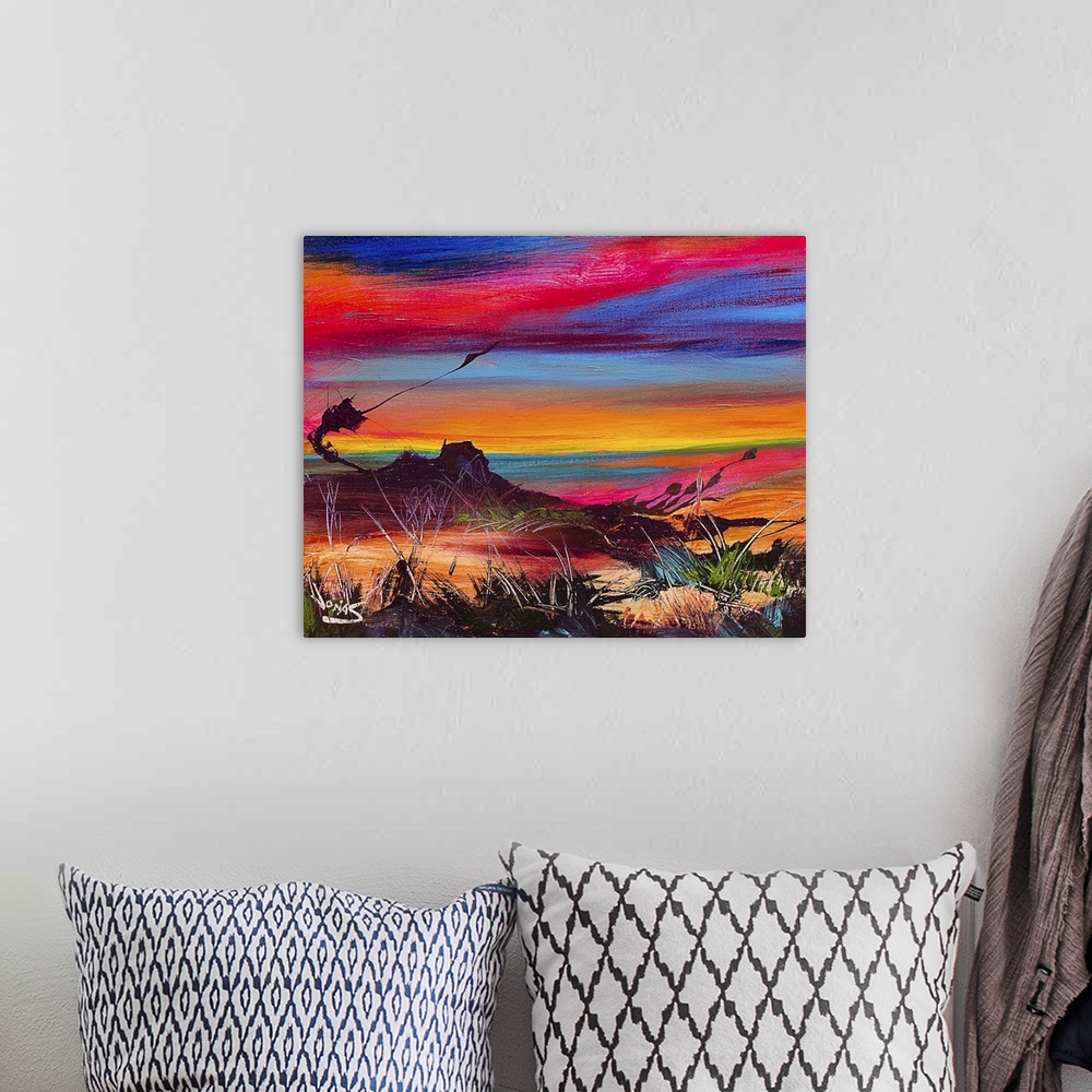 A bohemian room featuring Contemporary painting using a wide range of color of a desert landscape under sunset sky.