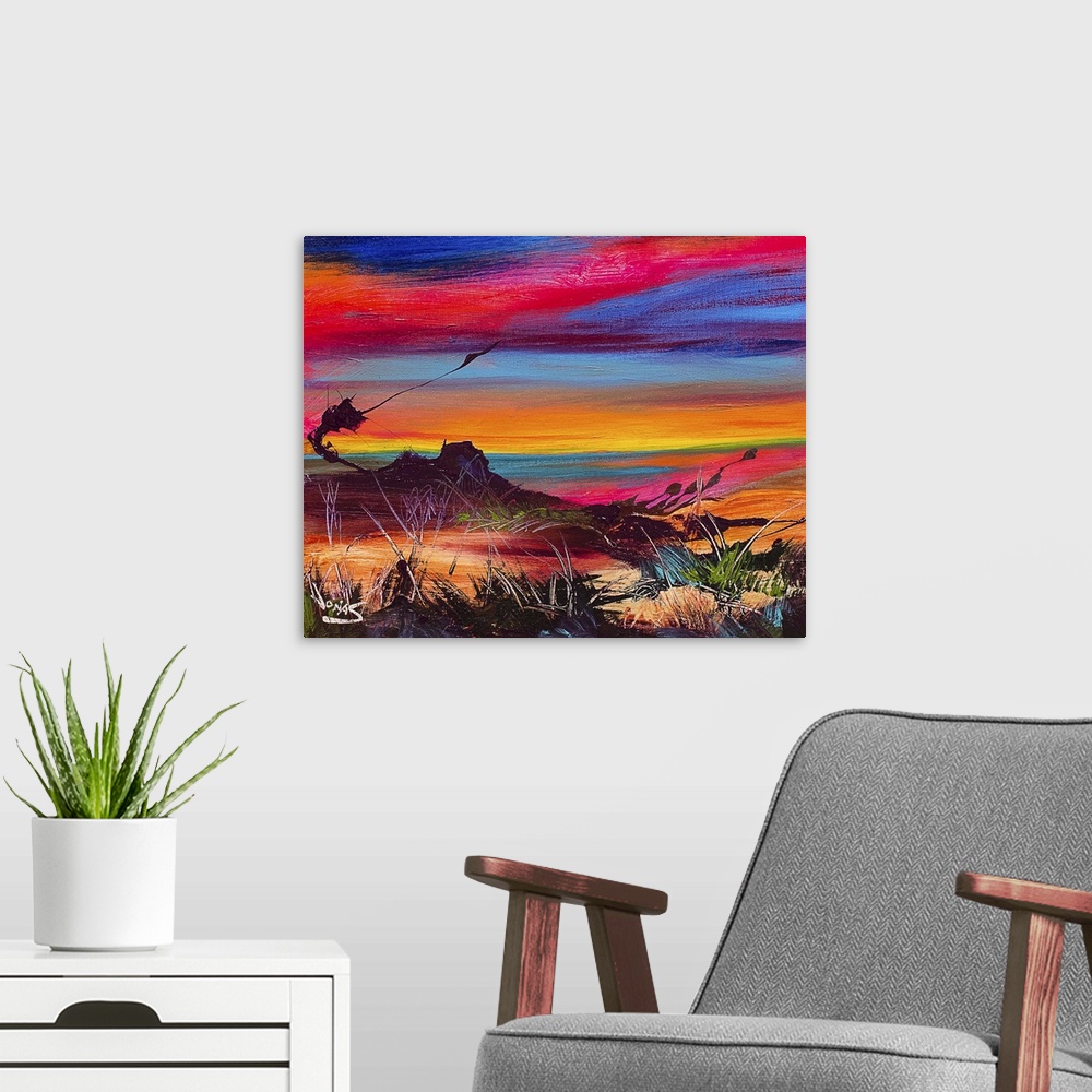 A modern room featuring Contemporary painting using a wide range of color of a desert landscape under sunset sky.
