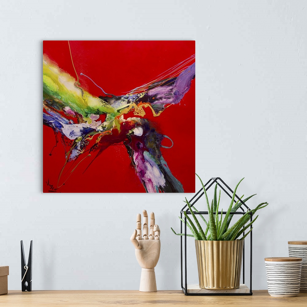 A bohemian room featuring Contemporary abstract painting using splashes of wild and vivid colors against a stark red backgr...