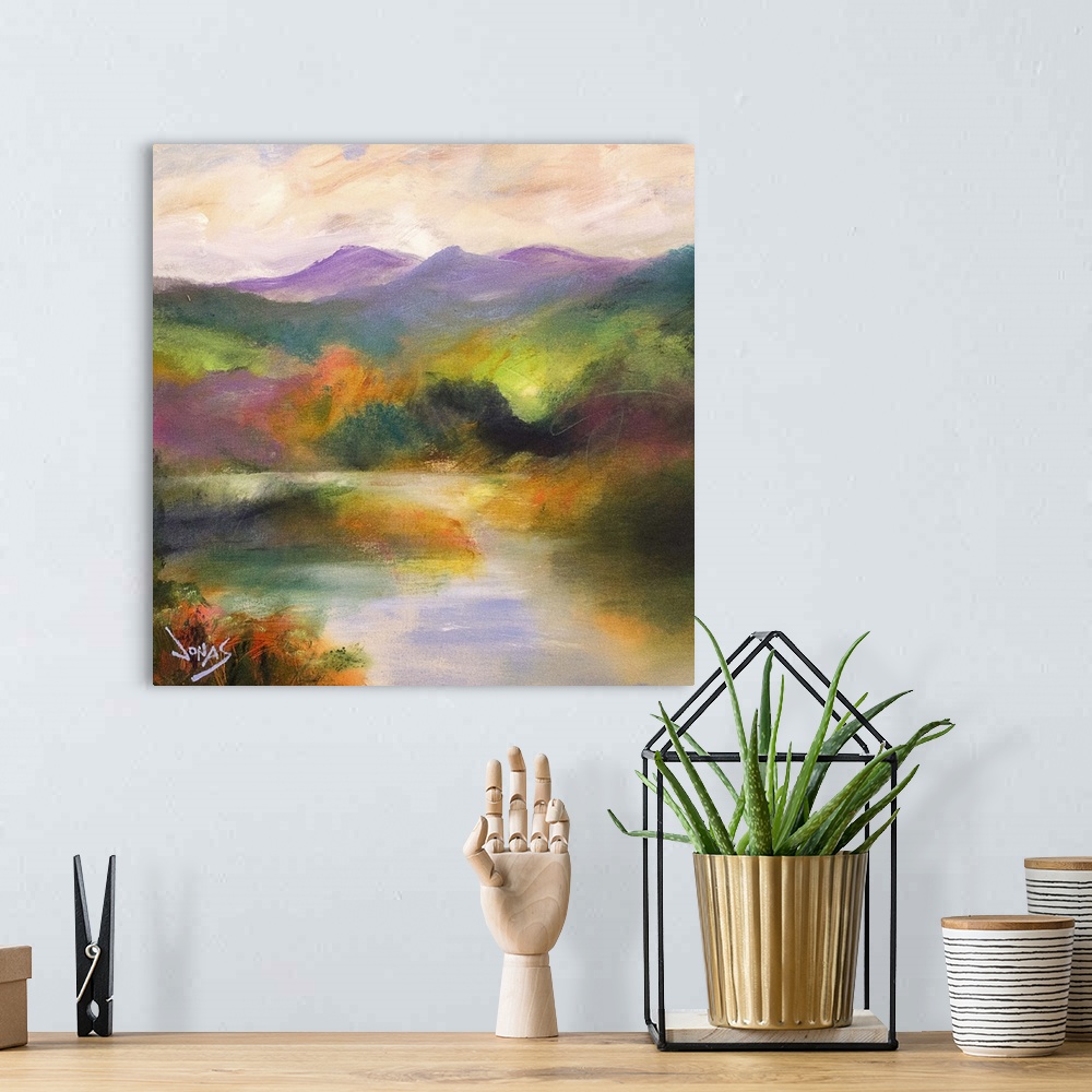 A bohemian room featuring Contemporary landscape painting ranging a gamut of color.