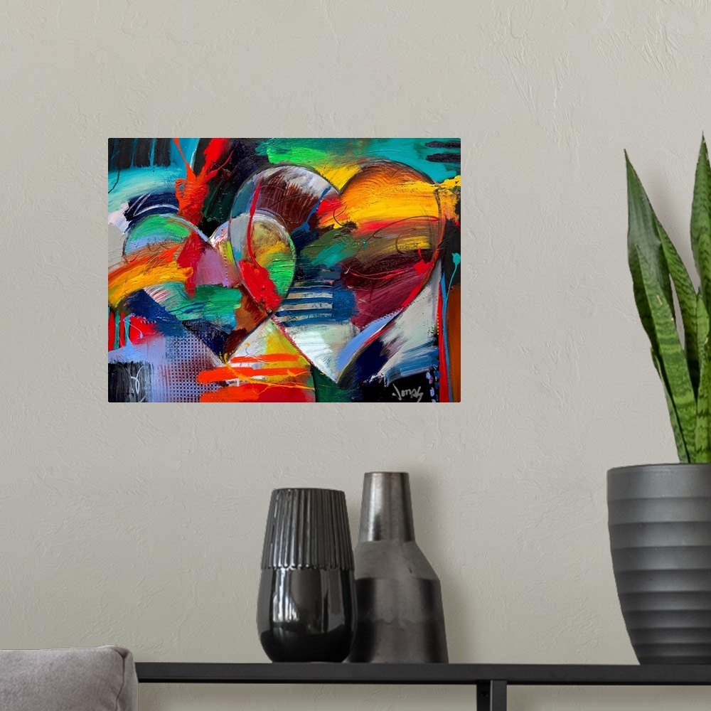 A modern room featuring Colorful abstract painting of two linking hearts.