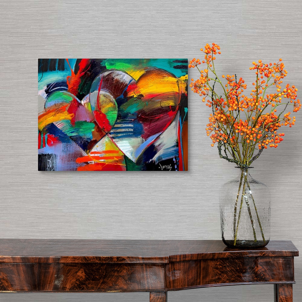 A traditional room featuring Colorful abstract painting of two linking hearts.