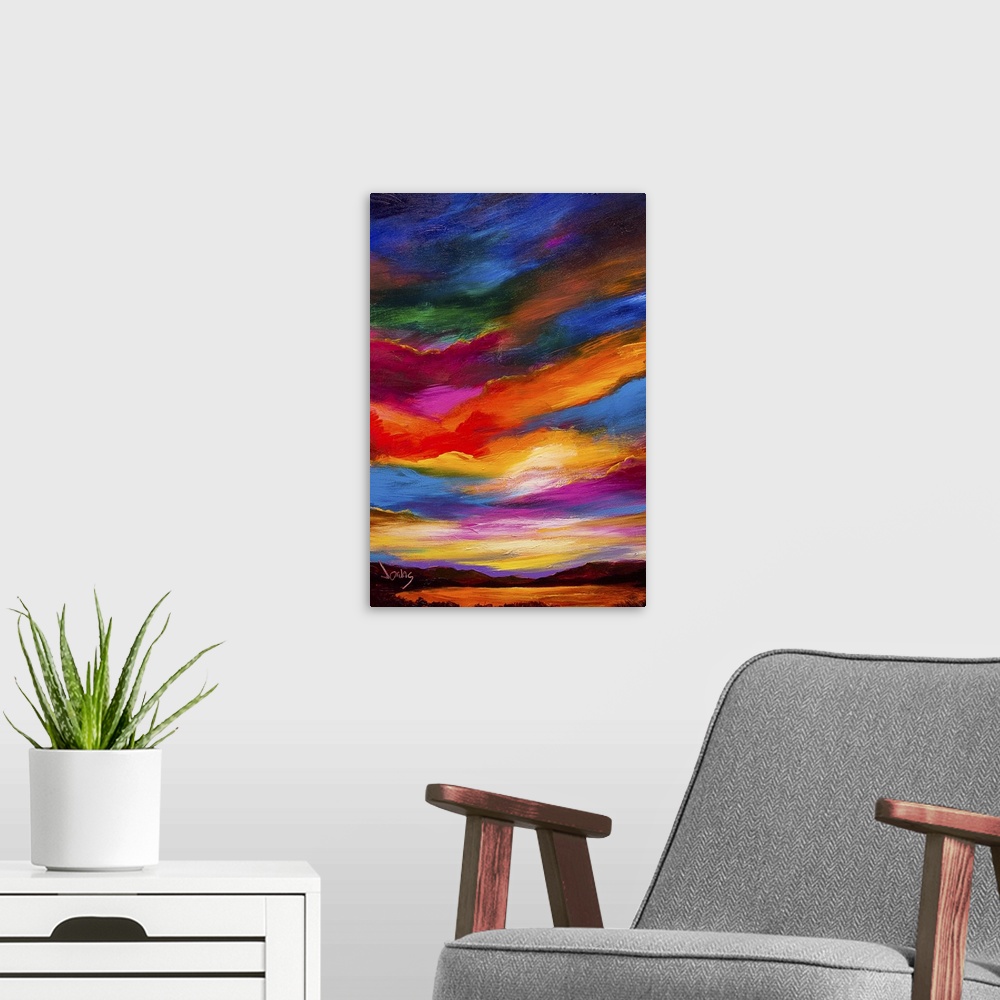 A modern room featuring A contemporary painting of a sunset sky ranging in a gamut of color.