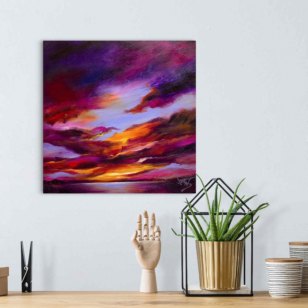 A bohemian room featuring Contemporary painting of a sunset sky in purple and orange tones over the water.