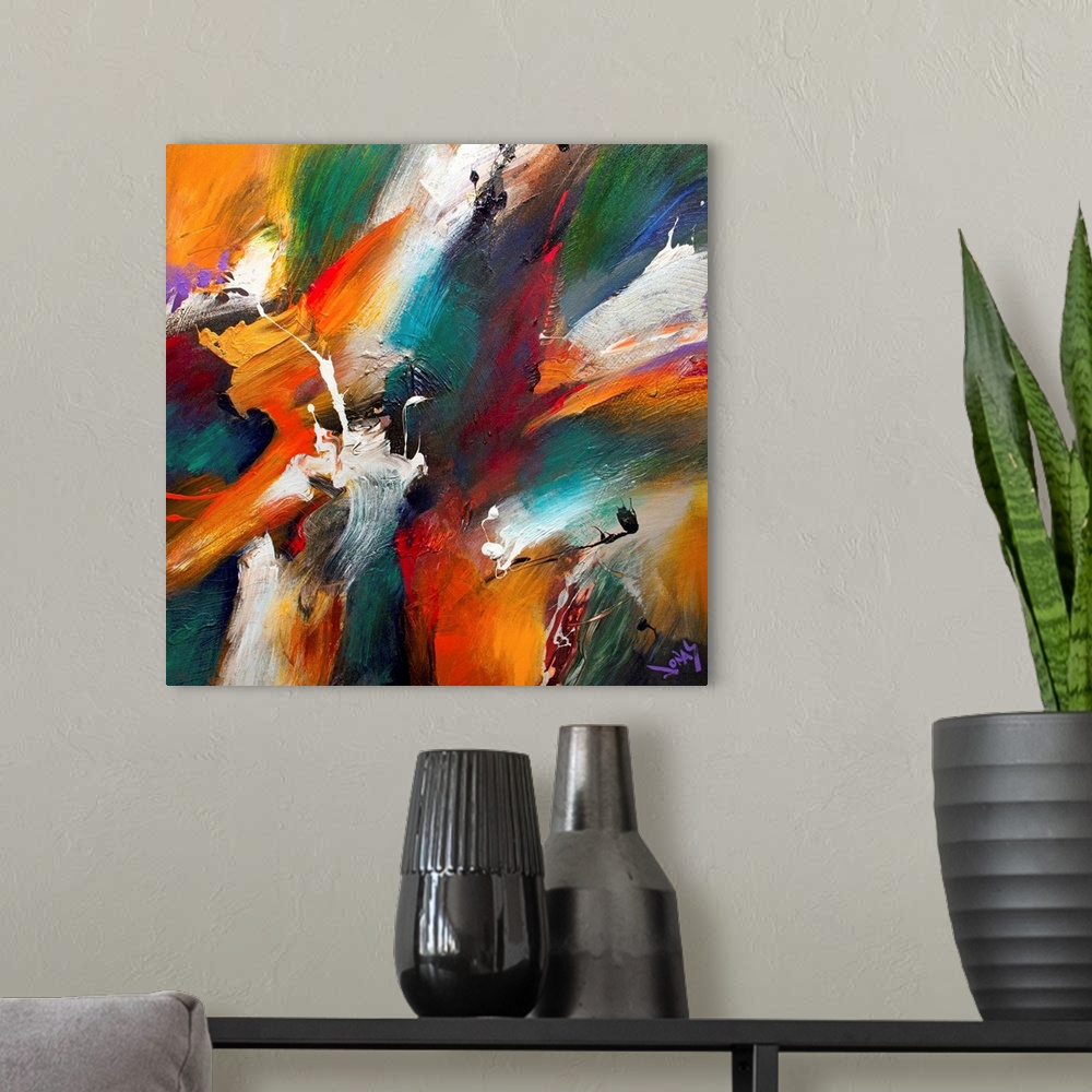 A modern room featuring Colorful abstract painting by Jonas Gerard with strokes and splatters of bright colors.