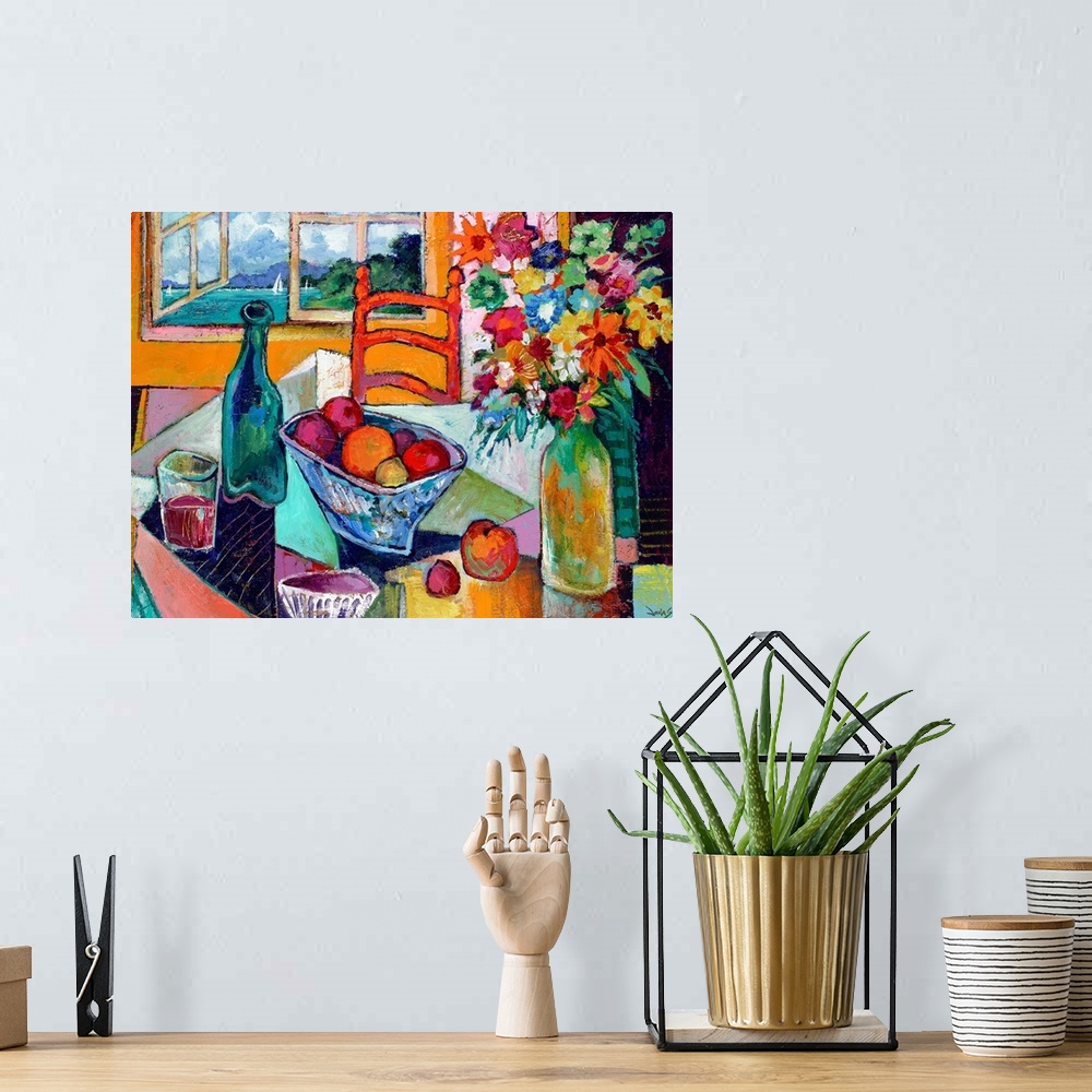 A bohemian room featuring Contemporary art painting of a table with fruit, flowers and wine next to an open window overlook...
