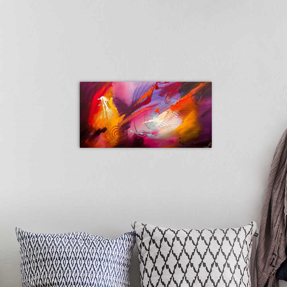 A bohemian room featuring An abstract piece of artwork that uses various colors of paint in dance like motions.