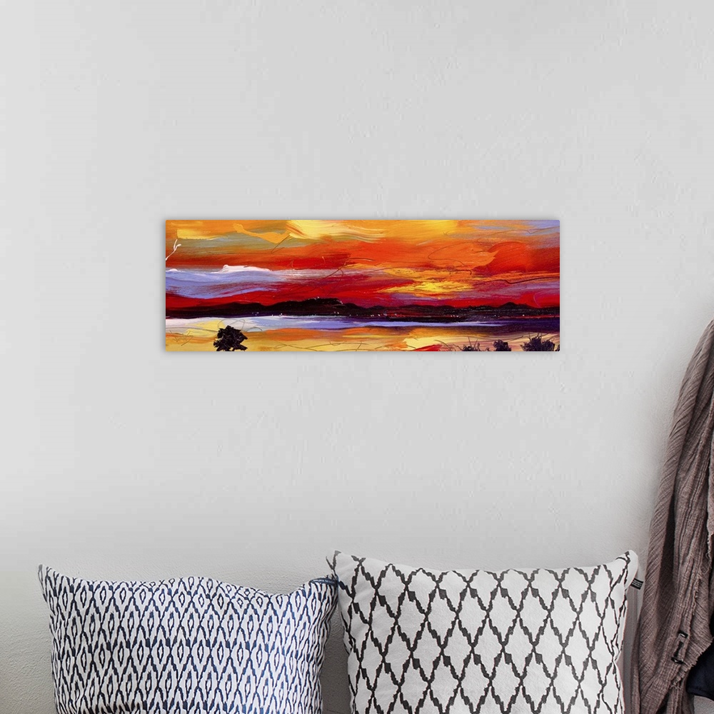 A bohemian room featuring Contemporary painting of a landscape under a vibrant warm sunset.