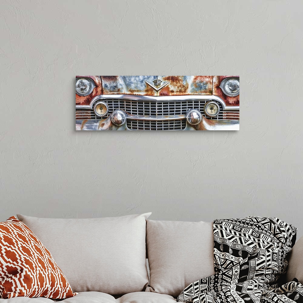 A bohemian room featuring 1950's Cadillac Fleetwood Front
