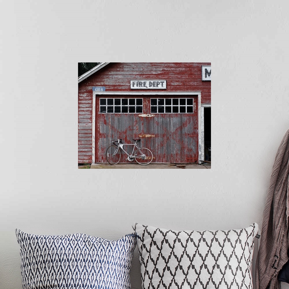 A bohemian room featuring Rustic fire dept. with a bicycle leaning against it in Michigan