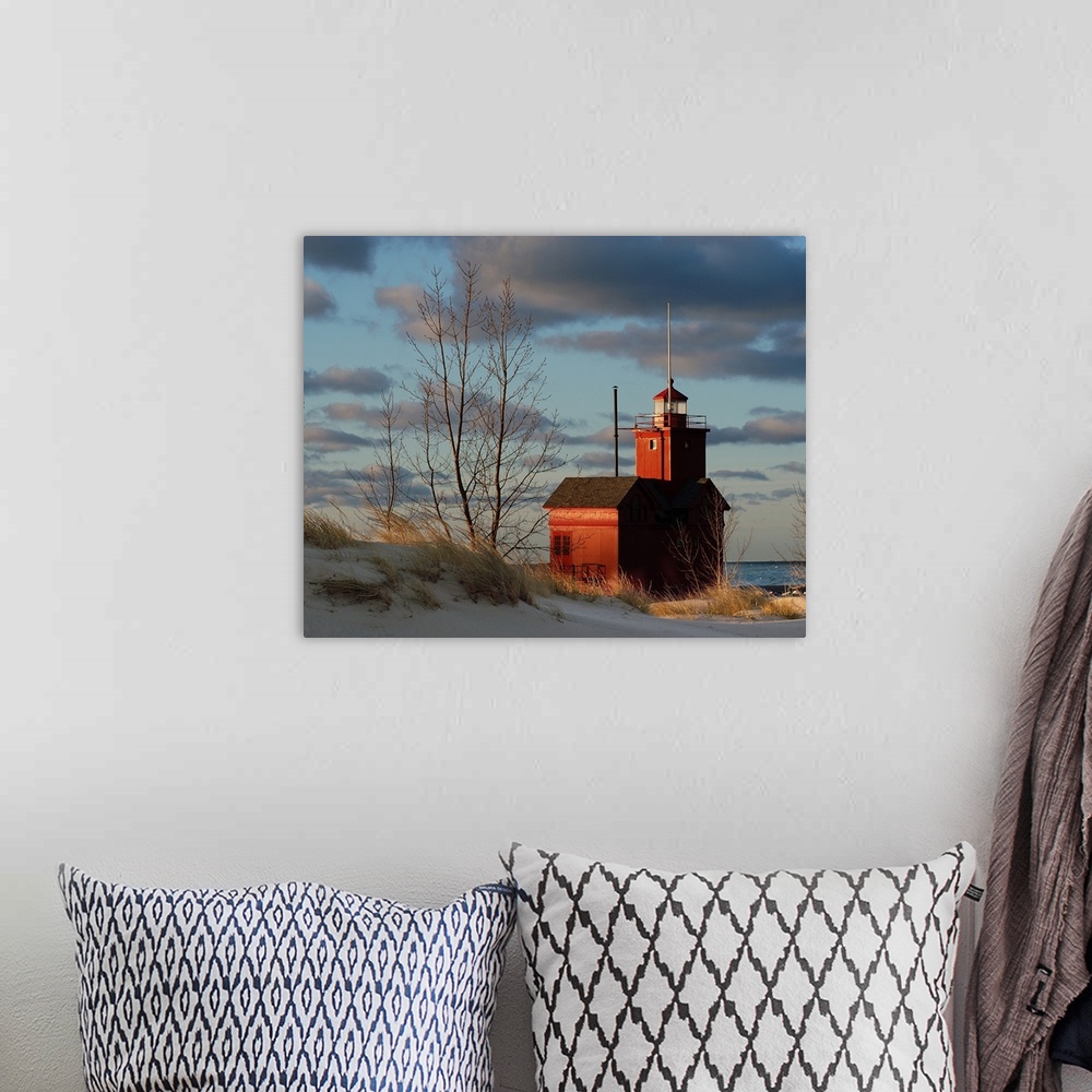 A bohemian room featuring Holland Michigan Lighthouse with a sunrise
