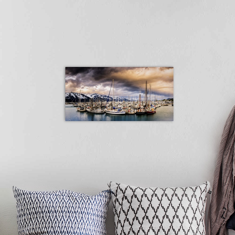 A bohemian room featuring Panoramic photograph of a huge group of sailboats sitting the middle of the water with snow cover...