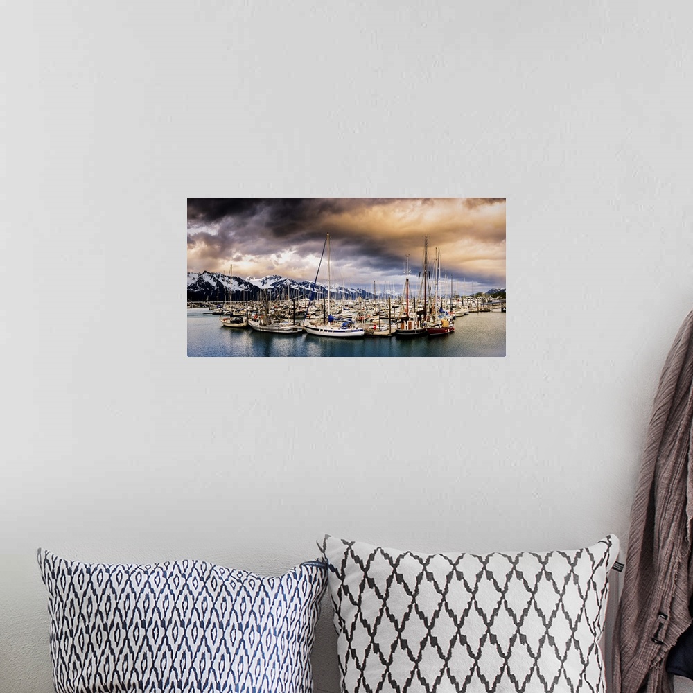 A bohemian room featuring Panoramic photograph of a huge group of sailboats sitting the middle of the water with snow cover...