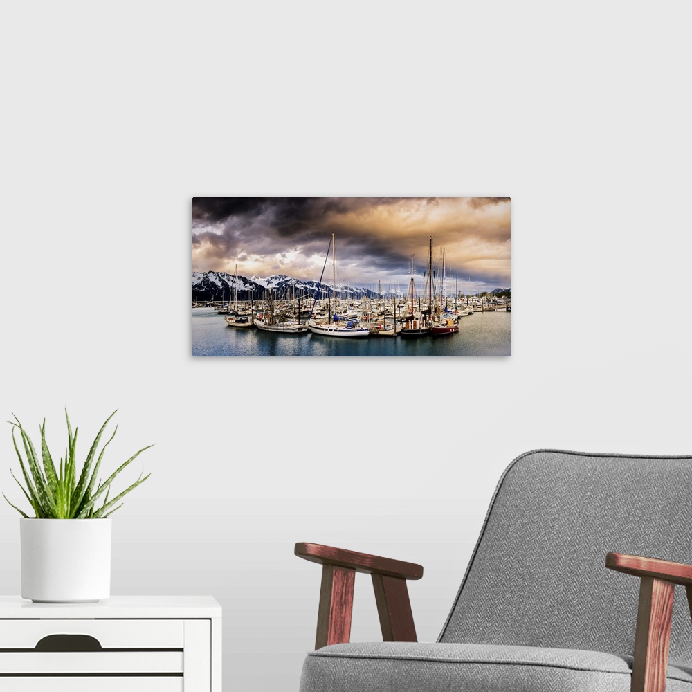 A modern room featuring Panoramic photograph of a huge group of sailboats sitting the middle of the water with snow cover...