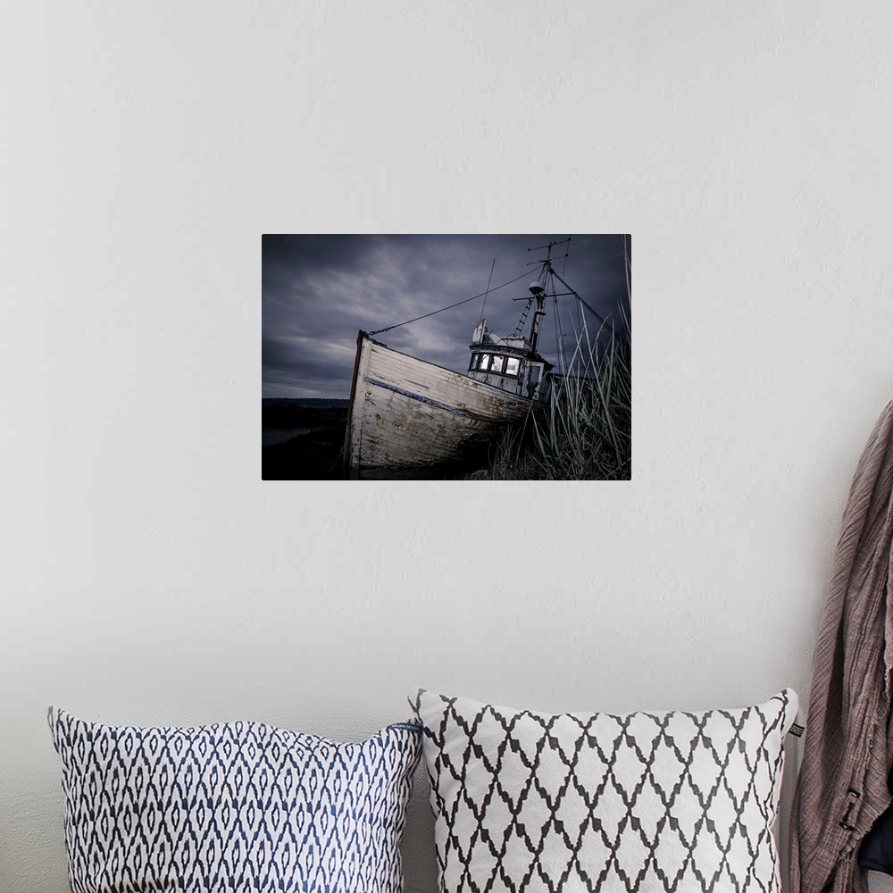 A bohemian room featuring An Abandoned Ship against a Dramatic Sky; Homer, Alaska