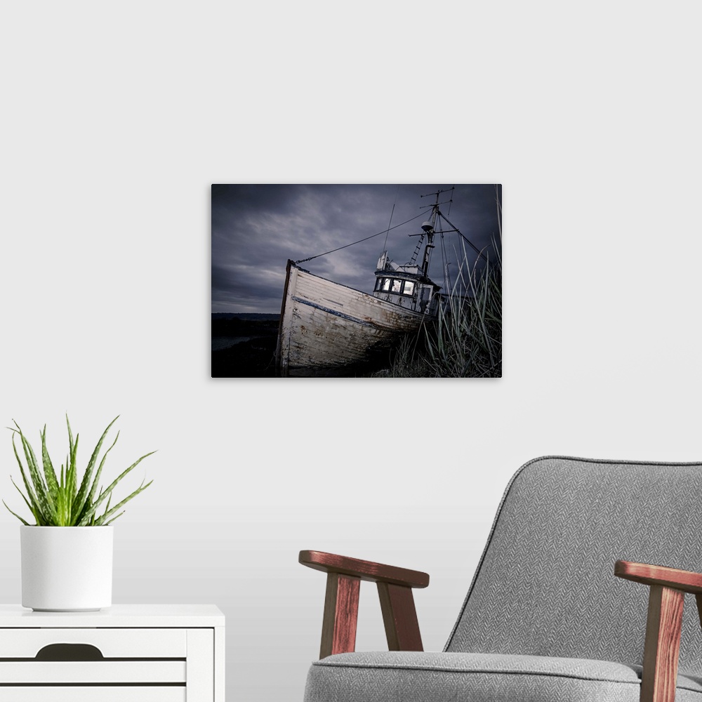 A modern room featuring An Abandoned Ship against a Dramatic Sky; Homer, Alaska
