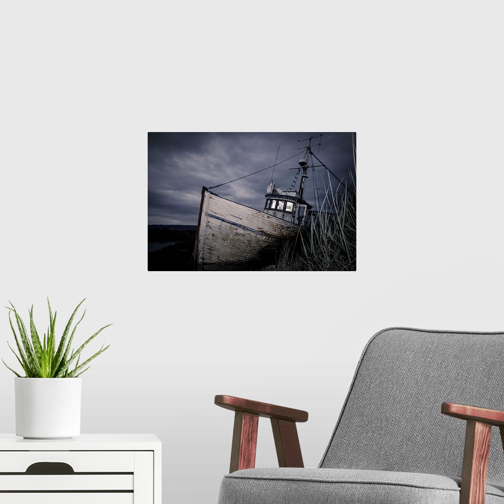 A modern room featuring An Abandoned Ship against a Dramatic Sky; Homer, Alaska