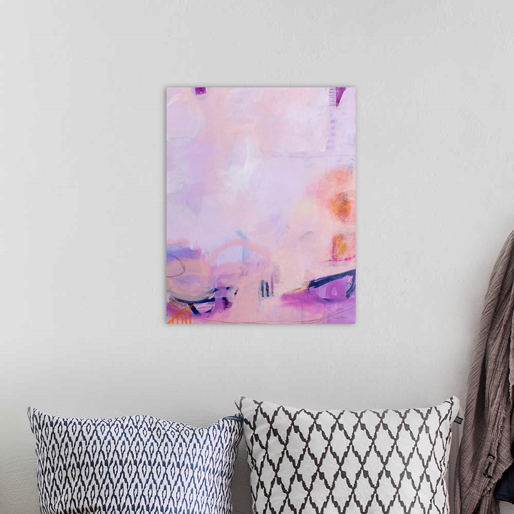 A bohemian room featuring Playful blush orange and navy marks throughout a delicate abstract painting.
