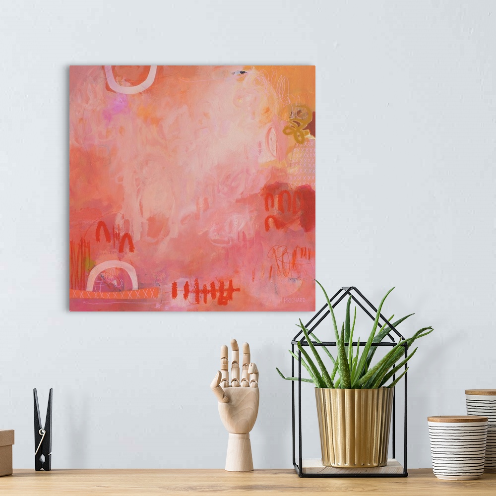 A bohemian room featuring Powerful graphic designs surround energetic brush strokes in this bright, orangey pink abstract p...
