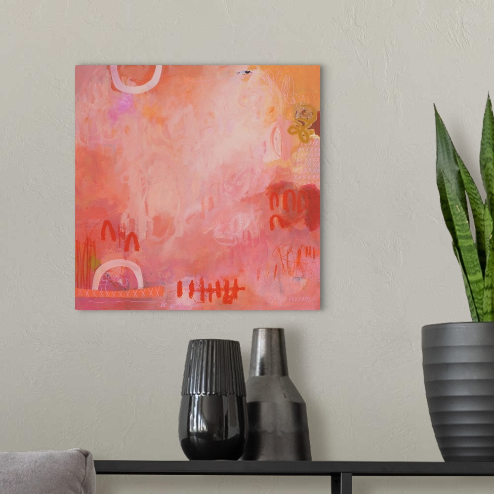 A modern room featuring Powerful graphic designs surround energetic brush strokes in this bright, orangey pink abstract p...