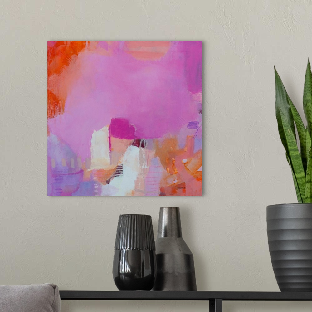 A modern room featuring Bright, happy abstract painting with magenta, bright orange and creamy neutrals.