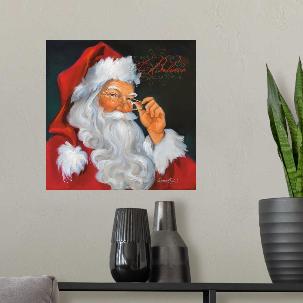 A modern room featuring Fine art painting of Santa Claus in a red suit with the word "Believe"  above his head.