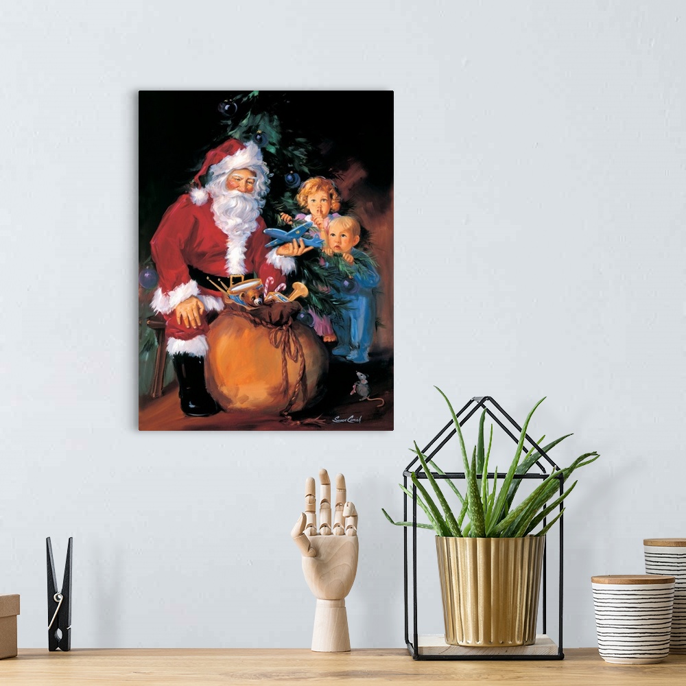 A bohemian room featuring Painting of Santa handing out toys to two children.