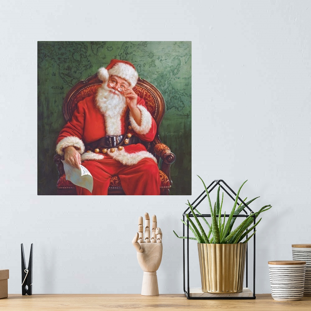 A bohemian room featuring Portrait of Santa sitting in a chair holding a letter.