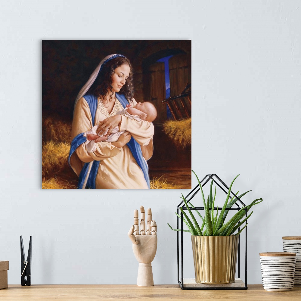 A bohemian room featuring Religious  painting of a woman holding a baby.