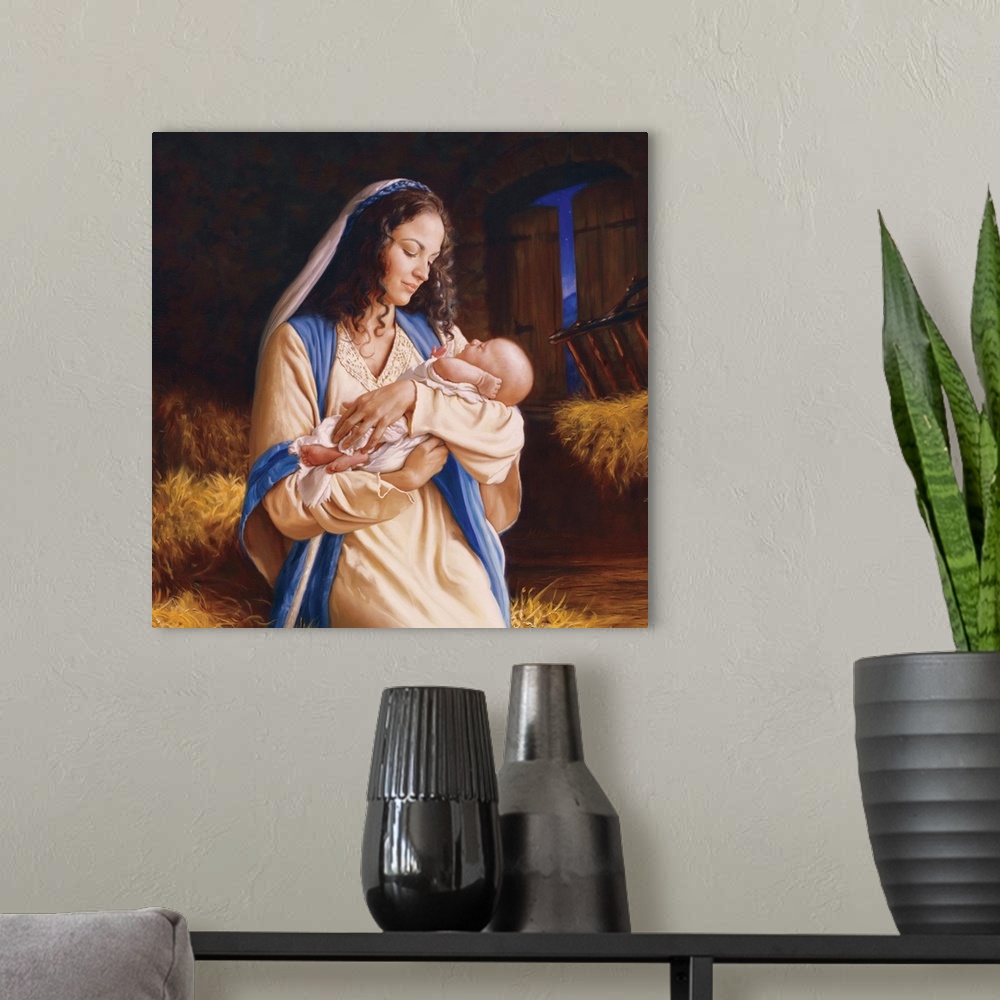 A modern room featuring Religious  painting of a woman holding a baby.