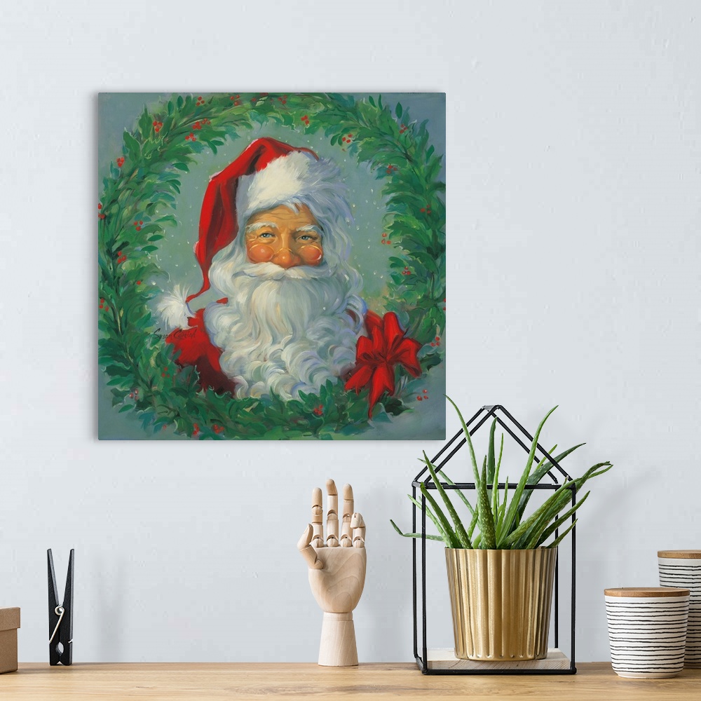 A bohemian room featuring Portrait of Santa surrounded by a wreath.