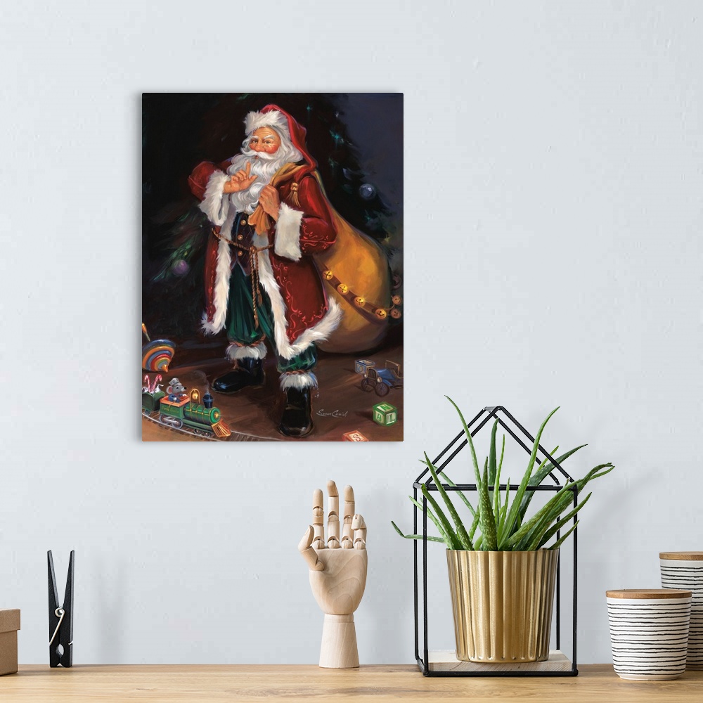 A bohemian room featuring Fine art painting of Santa Claus wearing a red coat with toys at his feet.