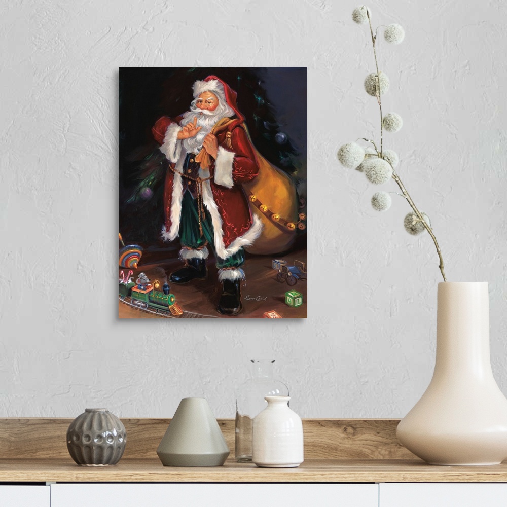 A farmhouse room featuring Fine art painting of Santa Claus wearing a red coat with toys at his feet.