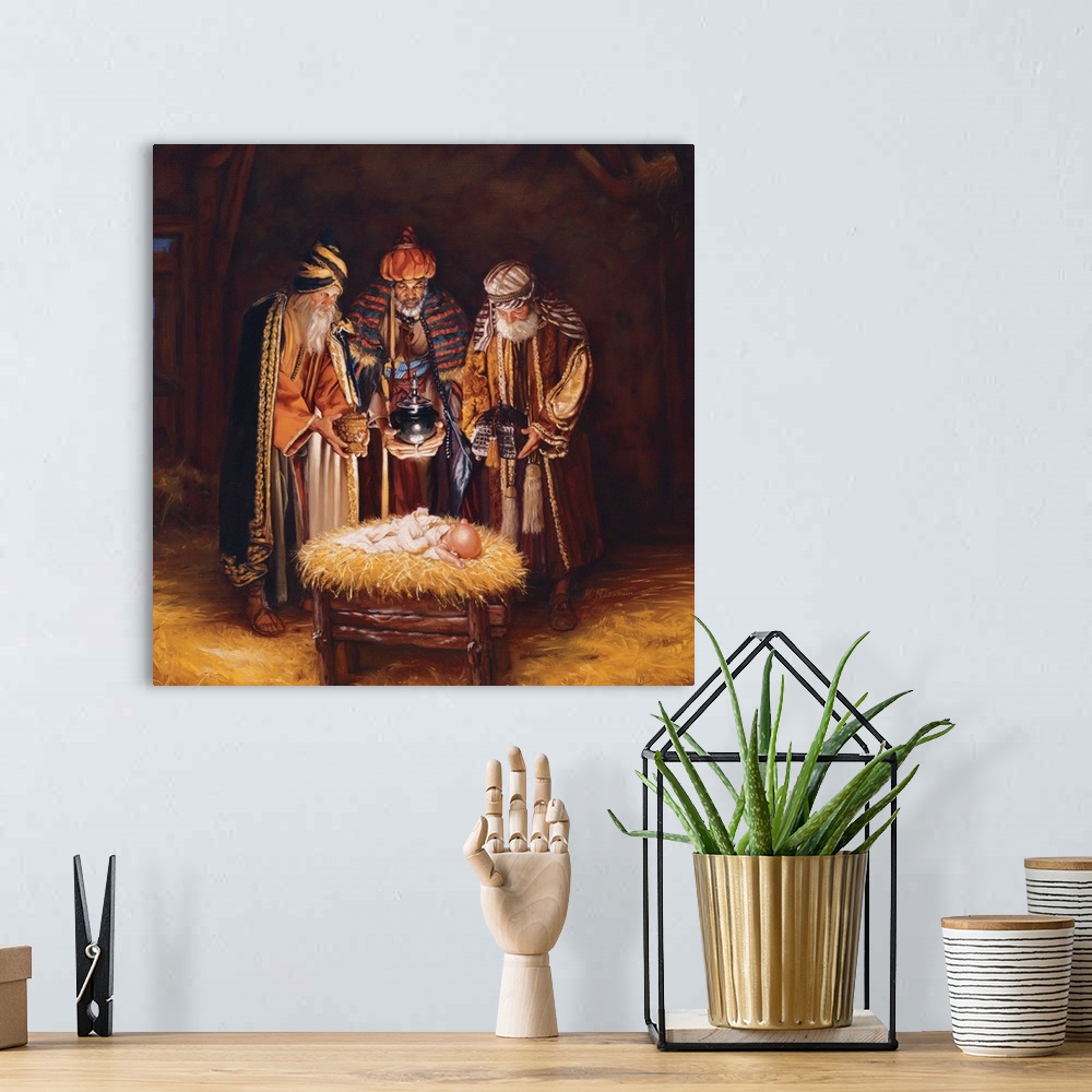 A bohemian room featuring Religious art of three wise men bringing baby Jesus gifts.