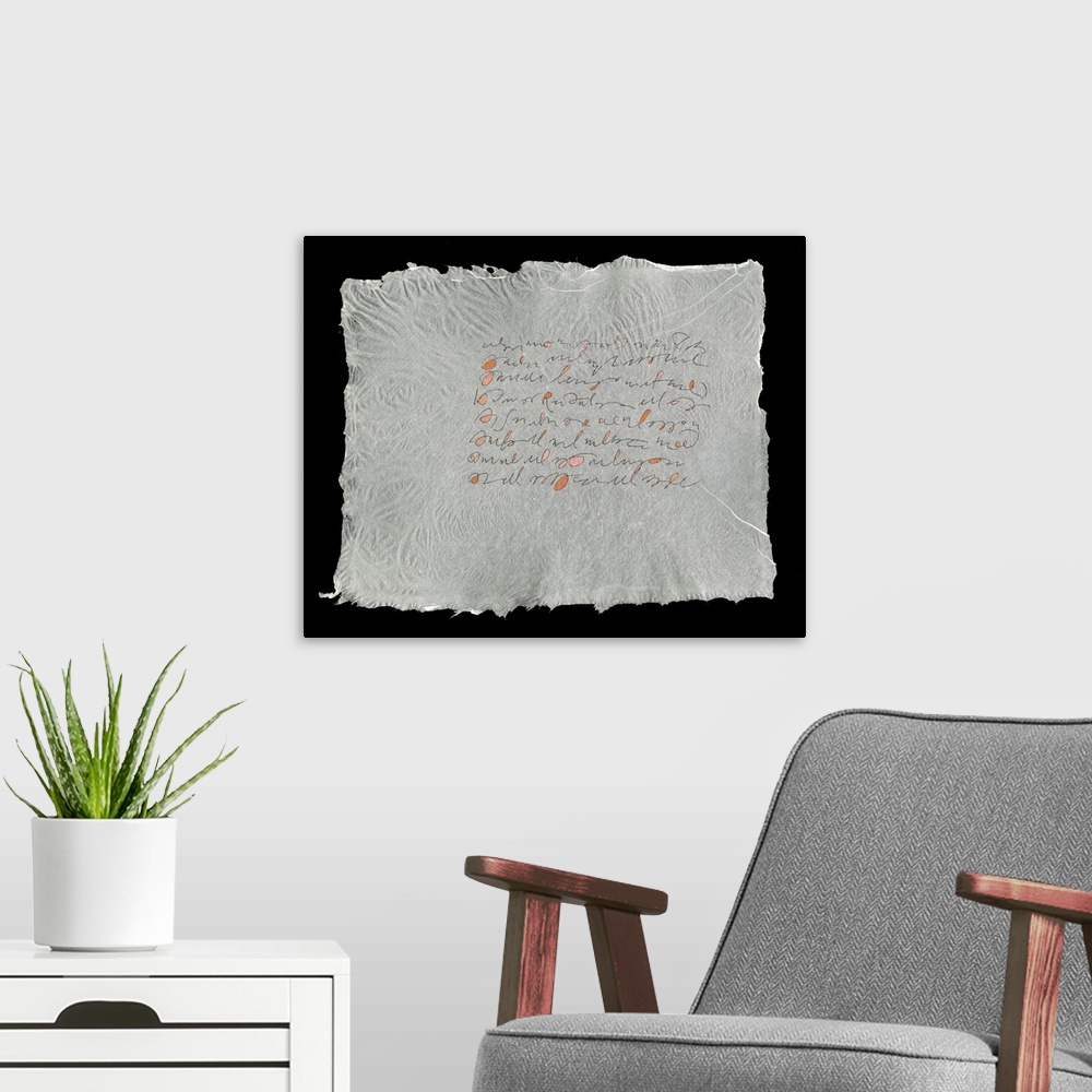 A modern room featuring Lines evoking handwriting set in a block on a sheet of handmade paper.