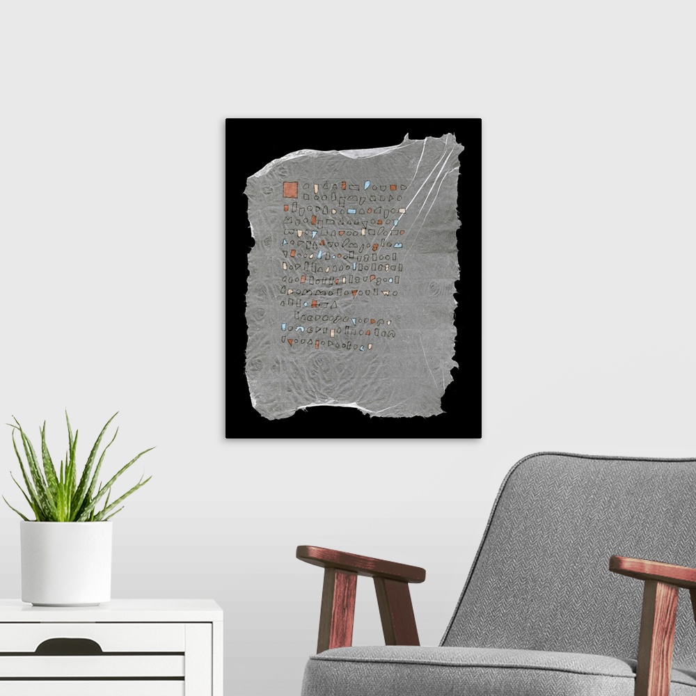 A modern room featuring Geometric shapes resembling text line up on handmade paper with great character.