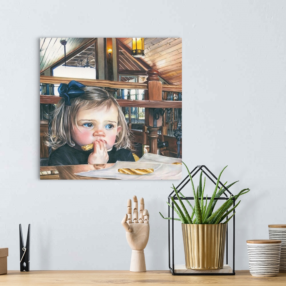 A bohemian room featuring A watercolor contemporary painting of a small child sitting at a table to eat.