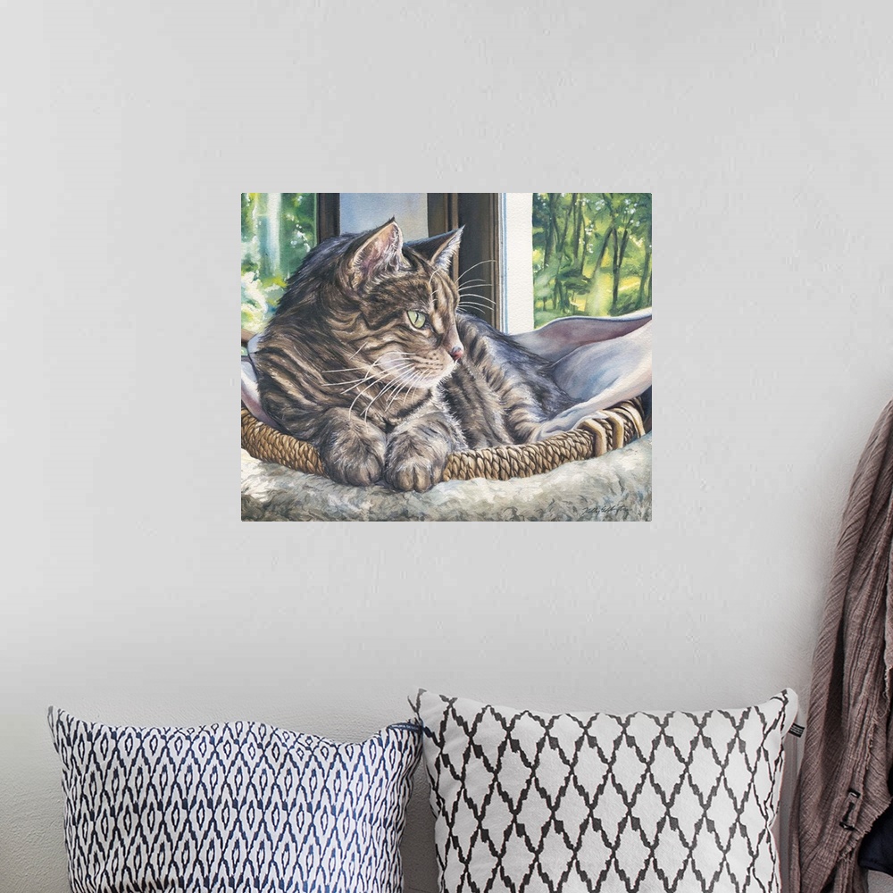 A bohemian room featuring Watercolor painting of a cat about to take an afternoon nap in her basket.