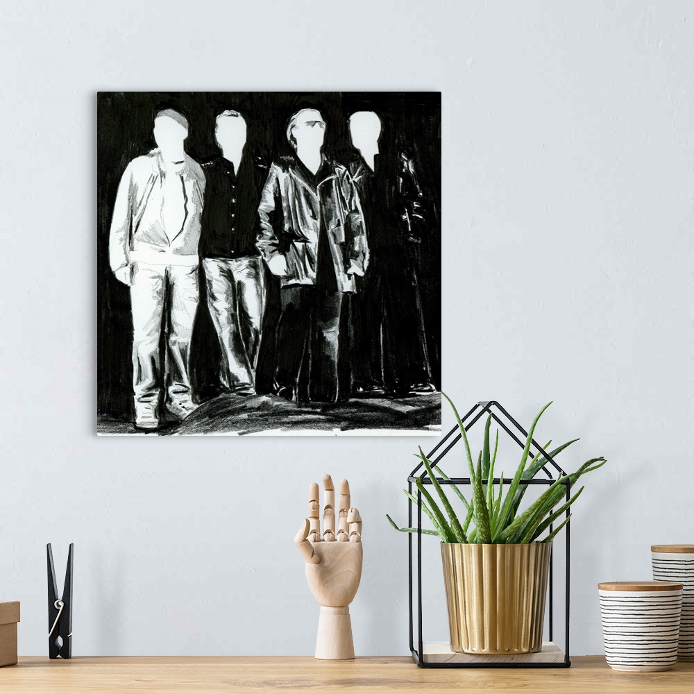 A bohemian room featuring Black and white drawing of U2 in a simple design.