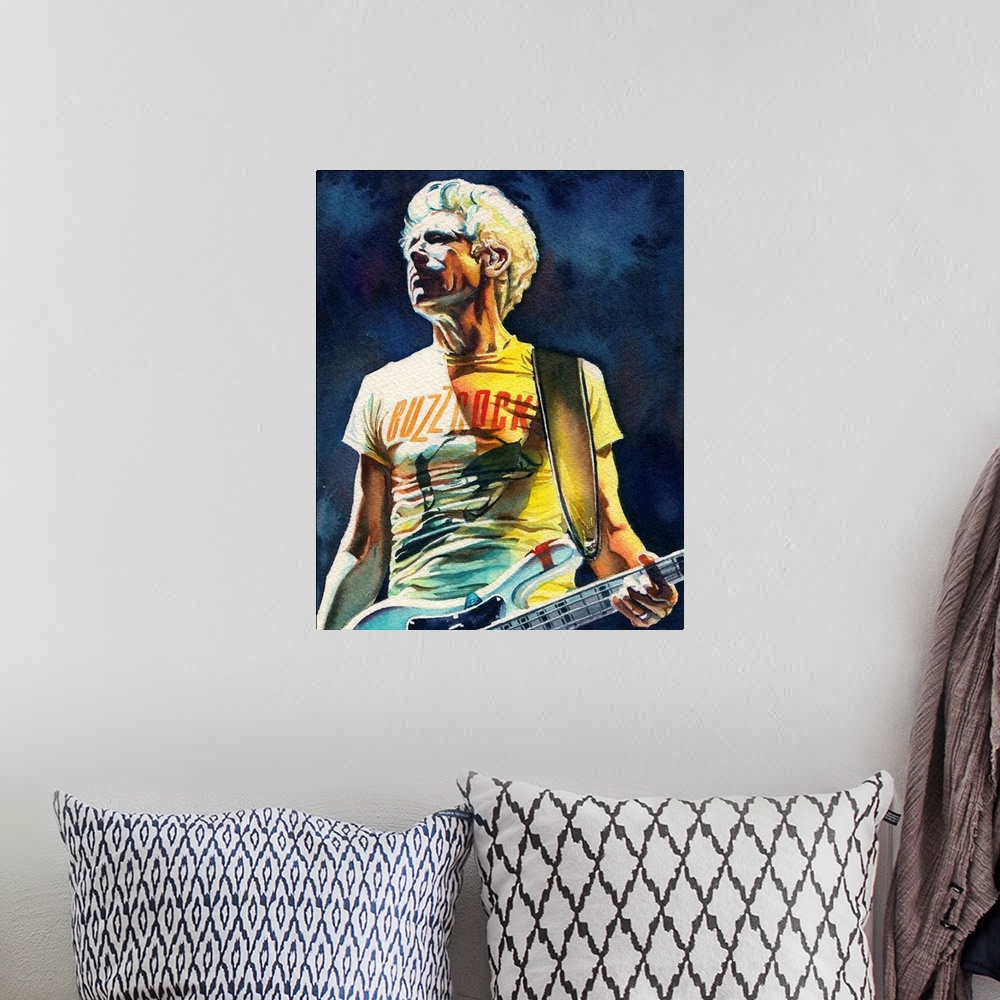 A bohemian room featuring Illustration for atu2.com of Adam Clayton from U2's Innocence and Experience tour in watercolor.