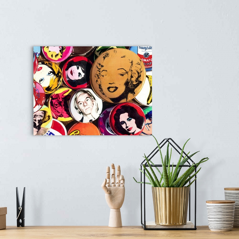 A bohemian room featuring Watercolor painting of a collection of Andy Warhol pins on a wooden table.
