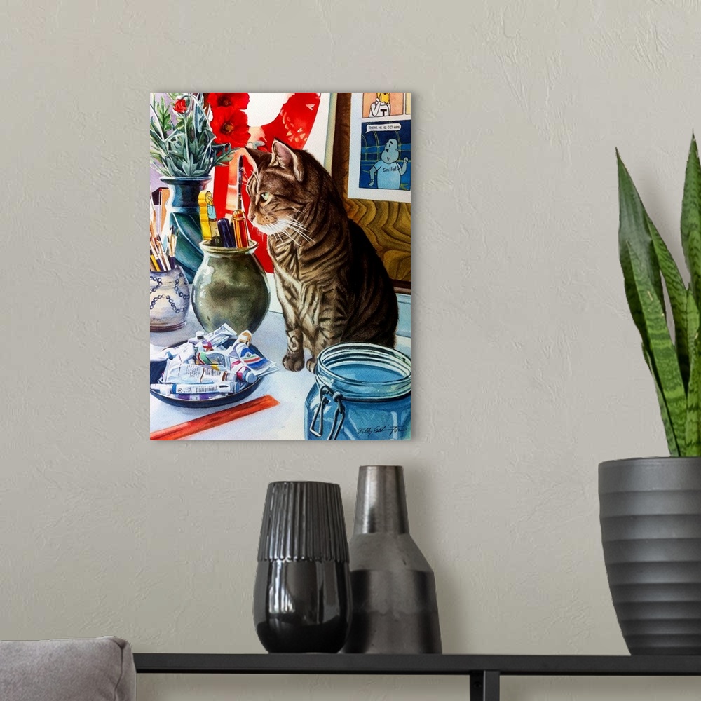 A modern room featuring A vertical watercolor painting of a cat sitting on a table in an artist studio.