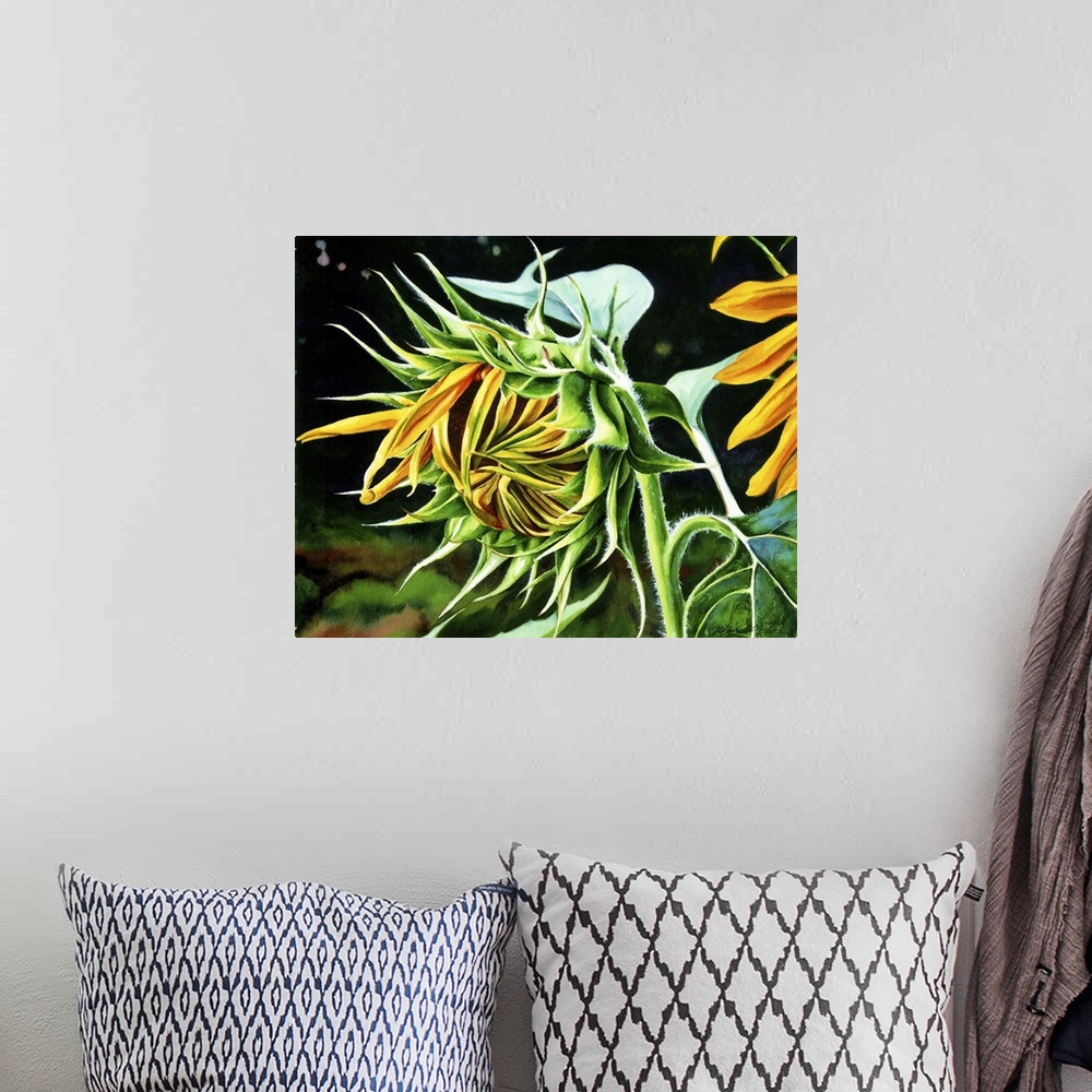 A bohemian room featuring A horizontal watercolor of a sunflower just starting to open up.