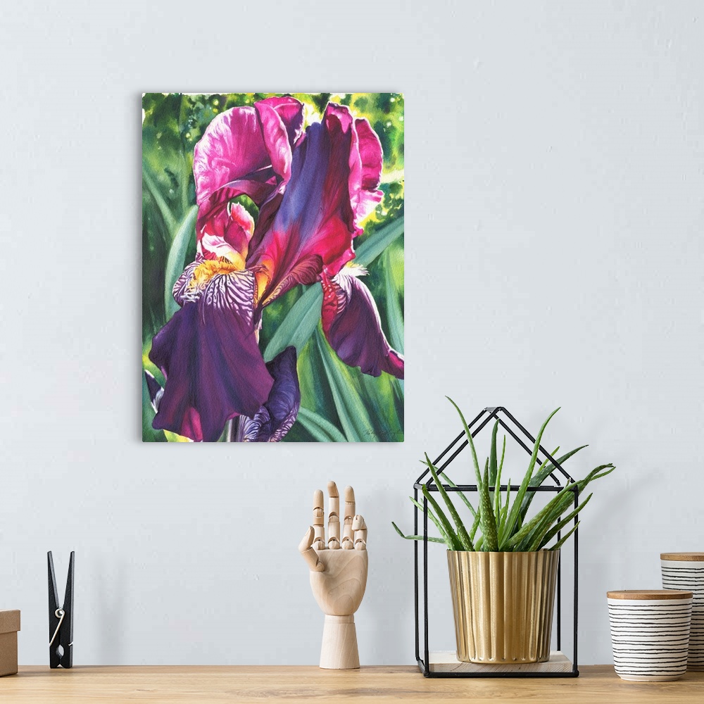A bohemian room featuring A vertical watercolor painting of a vibrant colored iris in tones of pink and purple.