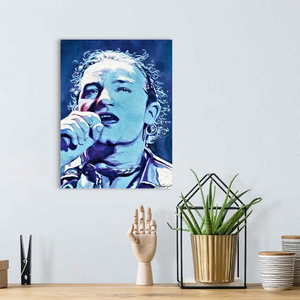 A bohemian room featuring Quick painting of Bono in watercolor.