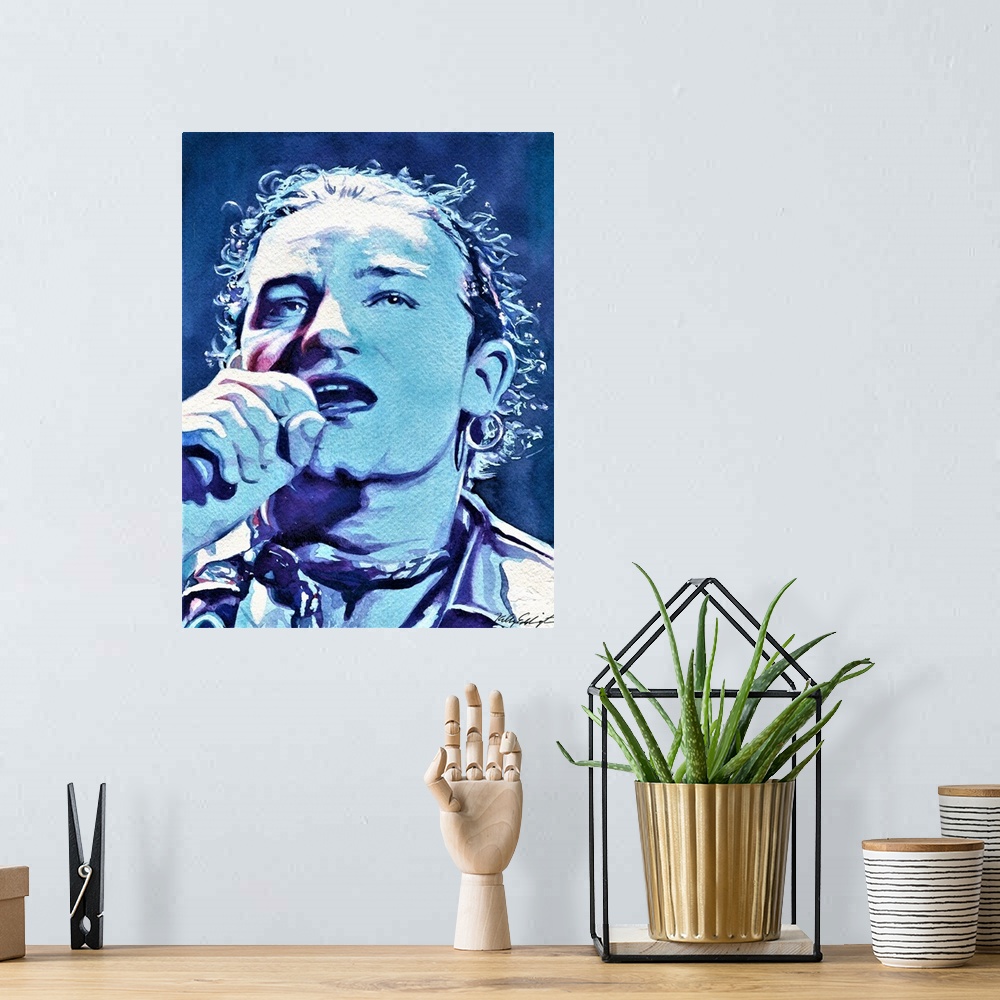 A bohemian room featuring Quick painting of Bono in watercolor.